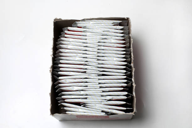 pack the creamer sachets neatly in a box