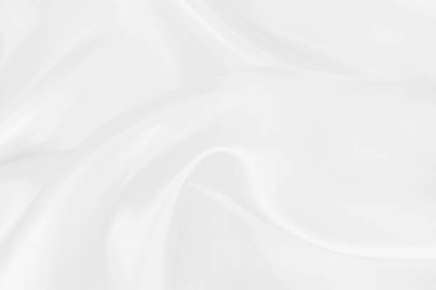 istock White fabric texture background, detail of silk or linen pattern. 2202078450