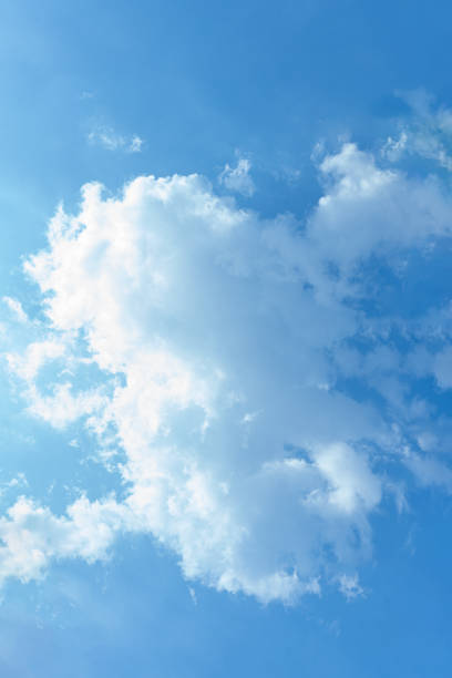 istock Serene Blue Sky with Fluffy White Clouds Beautiful Summer Day Background 2202084160