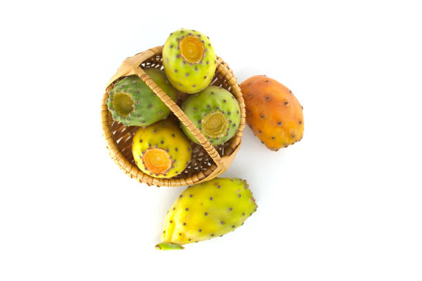 istock Vibrant prickly pears arranged in a wicker basket on white background, highlighting their vivid hues 2202089381