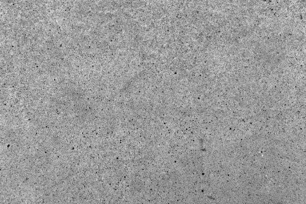 istock Gray concrete surface with porous rough texture and fine grain details 2202089839
