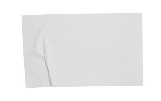 istock Crumpled white paper empty sticker mockup sheet, transparent background revealing intricate wrinkled surface and delicate texture 2202090112
