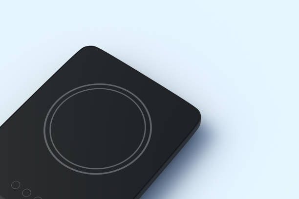 istock Empty induction cooktop on light gray background. Portable cooker. Modern electric hob. Copy space. 3d render 2202090157