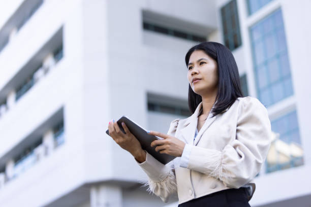 istock Future remote work combines technology smart phone connection online white digital business woman enable e-learning productivity while travel blend comfort modern devices serenity computer equipment 2202099965