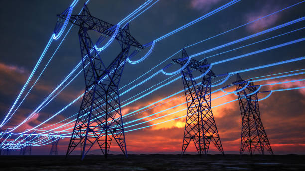 high-voltage power lines at sunset with digital energy flow - elektri̇k stok fotoğraflar ve resimler