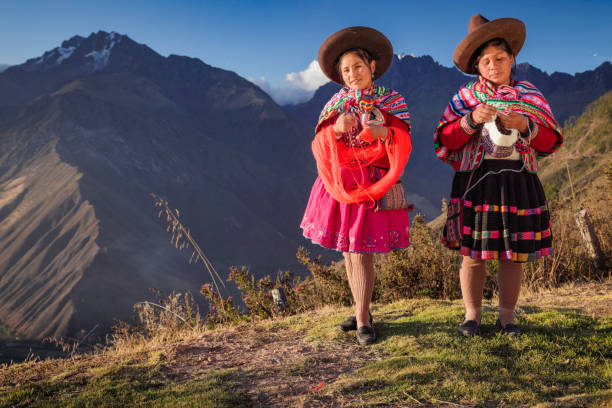 Peruvian women spinning wool by hand in Sacred Valley, Peru