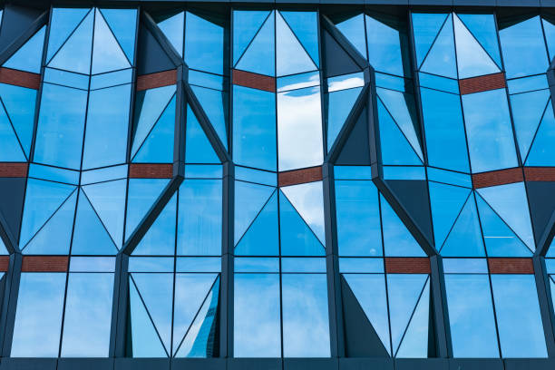 istock abstract geometric building. urban design. architectural engineering. storey exterior facade backdrop. background of architecture. building background of glass. architectural urban backdrop 2202104353