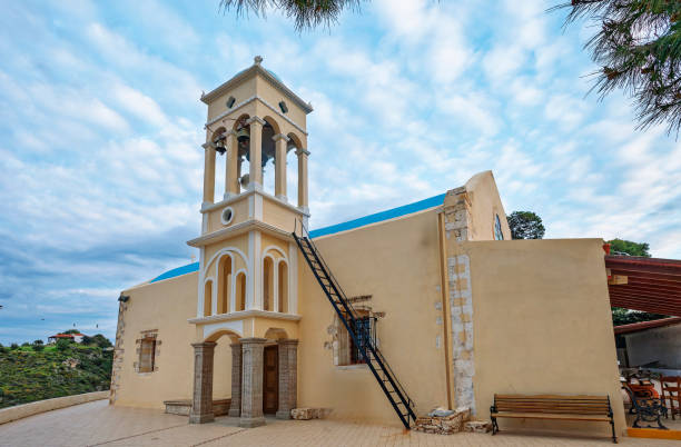 istock Traditional Bell Tower and Church Under Bright Sky During Daytime, Crete 2202104736
