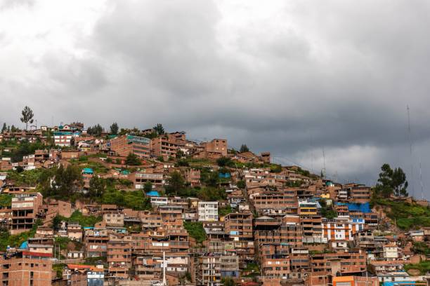 istock Hillside urban neighborhood under cloudy sky 2202106193