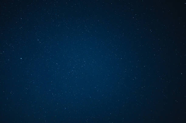 Starry night over the mountain with milky way sky at Thailand