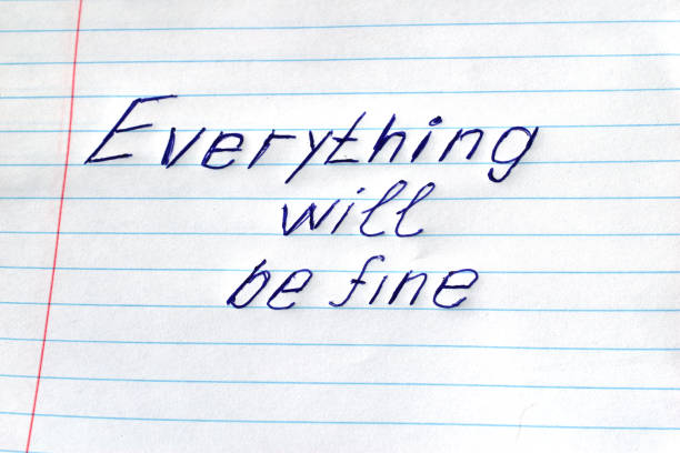 On a lined sheet of a school notebook it is written in pen that everything will be fine.