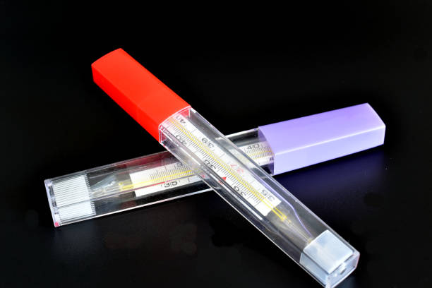 istock Two mercury thermometers for measuring human body temperature. 2202112184