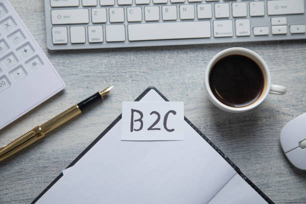 istock B2C business model on paper. Business concept 2202112646