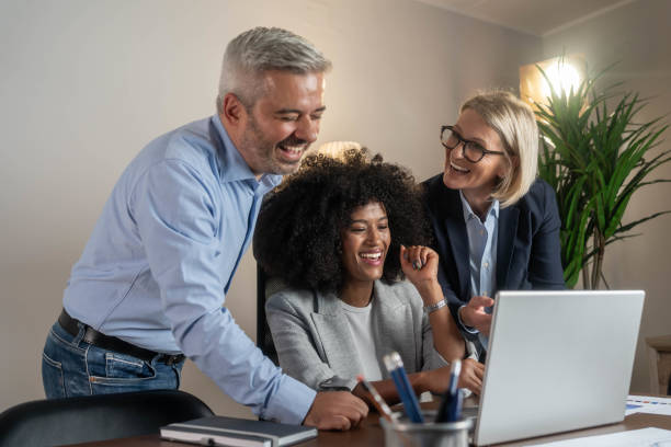 istock Successful group of businesspeople having a briefing 2202117899