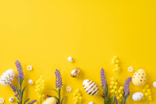 istock Colorful Easter egg decorations and vibrant spring flowers styled creatively on yellow. This cheerful seasonal background evokes joy, Easter celebrations, and the freshness of spring festivities 2202118162