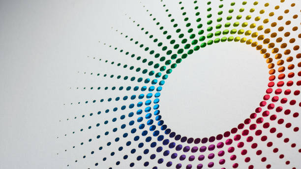 istock Vibrant Sunburst Cut Paper Artwork Featuring Circular Gradient Pattern of Colorful Dots on White Background 2202122857