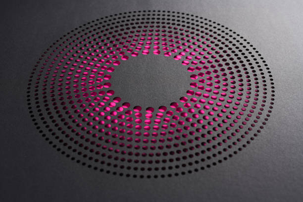 istock Circular Cut Paper Artwork with Concentric Dot Pattern and Vibrant Pink Backdrop on Dark Background 2202122971