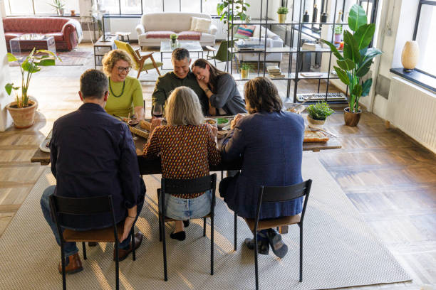 istock Joyful Dinner Party with Friends - Togetherness, Laughter & Gourmet Dining 2202123636