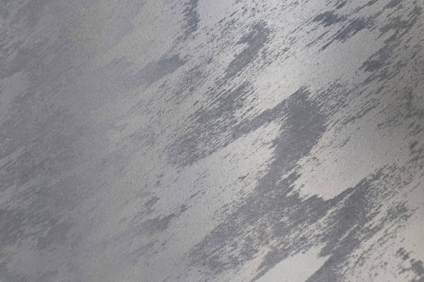 Silvery grey venetian decorative plaster close up.