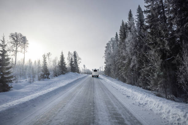 istock Camper on an icy snow road in winter 2202127185