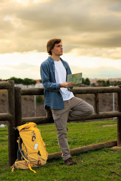 istock Thoughtful traveler sketching outdoors. Madrid, Spain. 2202131019
