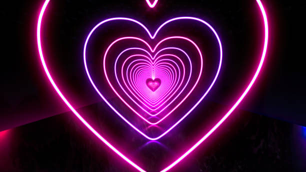 istock Colorful heart shapes create an inviting light tunnel with changing neon hues in a captivating art installation 2202136061
