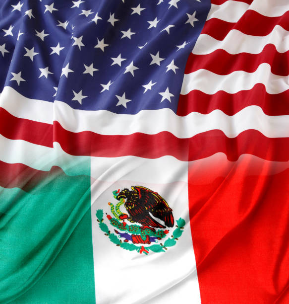 istock America and Mexico flags together 2202136256