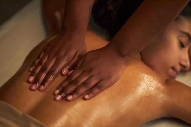 istock Receiving Relaxing Massage at Wellness Spa 2202137562