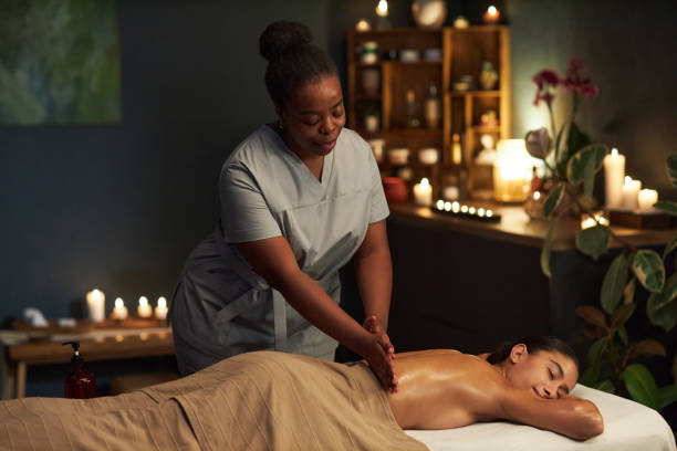 istock Spa Therapist Giving Relaxing Massage to Client 2202137572