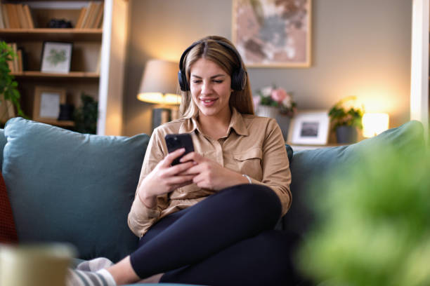 istock Young women playing on a mobile phone 2202137729
