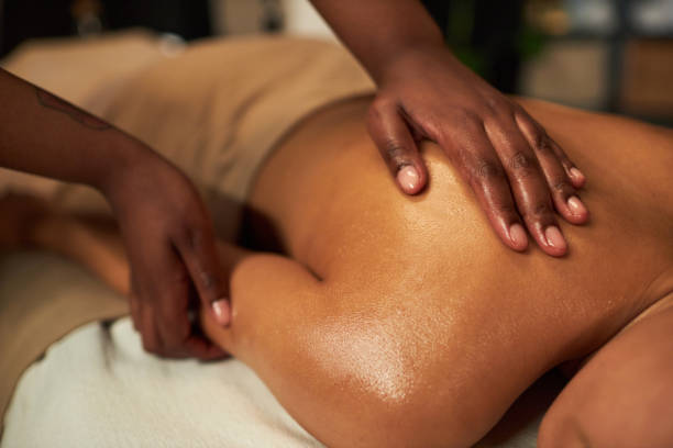 istock Receiving Therapeutic Massage on Upper Back Area 2202137746