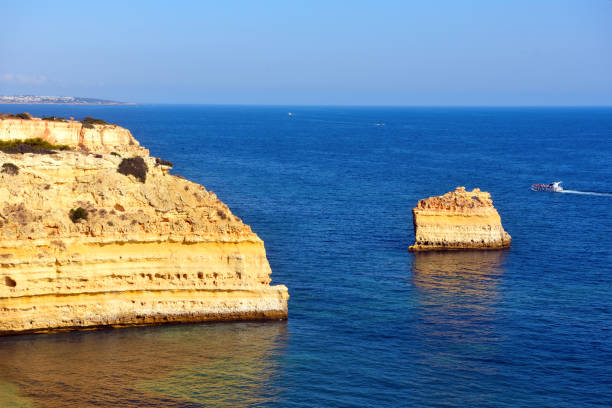 walking path with breathtaking views through the coast from porches to benagil caves lagoa algarve portugal
