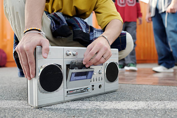 istock Holding Vintage Cassette Player with Close-Up View 2202140977