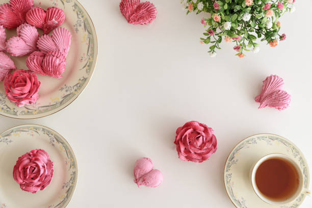 istock Romantic Tea Party with rose and heart shape marshmallow. Valentine's Day celebration. Flat lay 2202141131