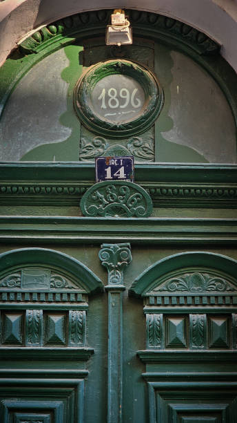 istock Green wooden doors 2202141879