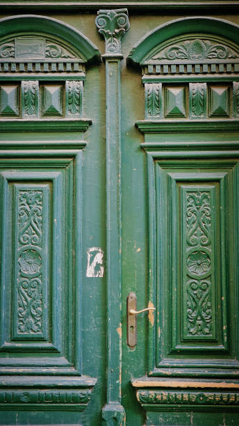 istock Green wooden doors 2202141895