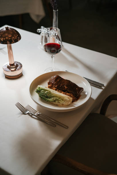 istock Delicious Pasta Dish Served at a Cozy Restaurant Table 2202143698