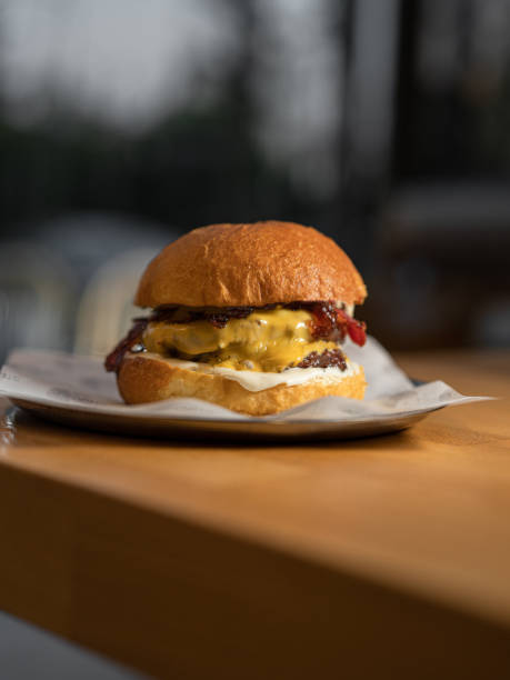 istock Perfectly Grilled Burger with Cheese and Caramelized Onions 2202144168