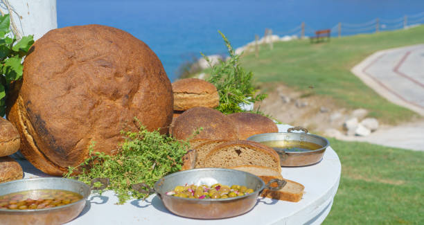 A selection of fresh fruits, vegetables, and protein-packed dishes served on a rustic wooden table.