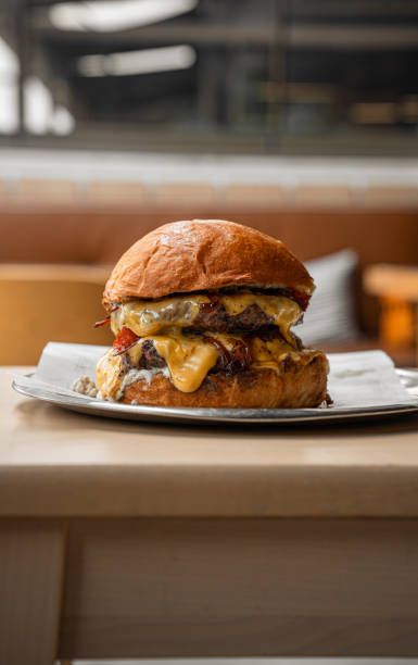 istock Gourmet Beef Burger with Fresh Lettuce and Tomato 2202145238