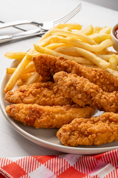 istock Chicken tenders. Fried chicken breast strips 2202145399