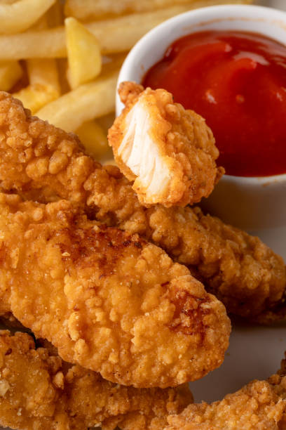 istock Chicken tenders. Fried chicken breast strips 2202145444