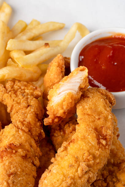 istock Chicken tenders. Fried chicken breast strips 2202145485