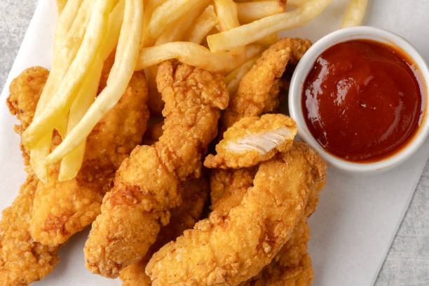 istock Chicken tenders. Fried chicken breast strips 2202145514