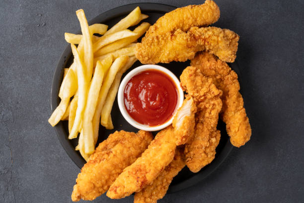 istock Chicken tenders. Fried chicken breast strips 2202145532