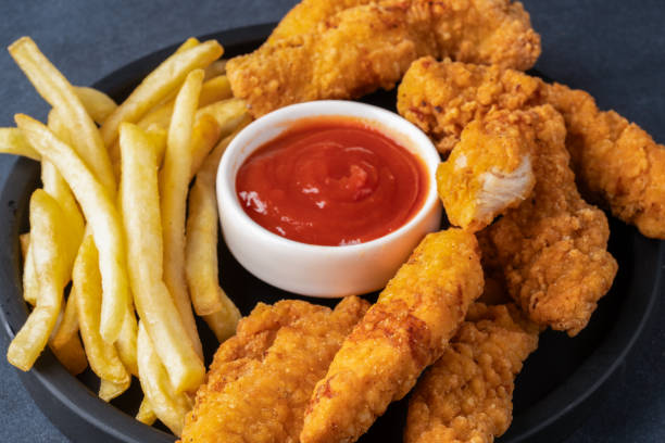 istock Chicken tenders. Fried chicken breast strips 2202145581