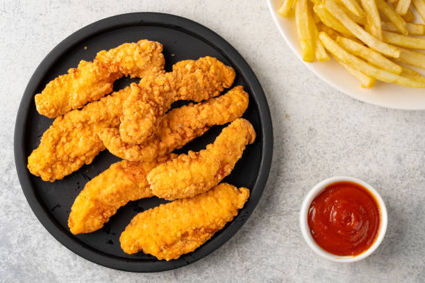 istock Chicken tenders. Fried chicken breast strips 2202145715