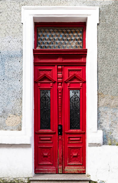 istock Carved old red wooden door 2202146247