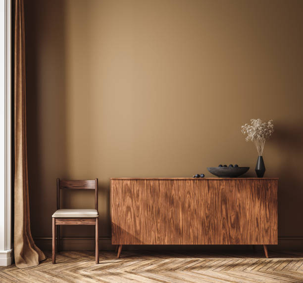 istock Frame mockup in dark brown living room with commode and decor 2202147036