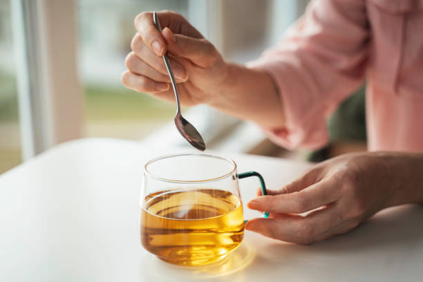 istock Dropping Essence in Tea for Enhanced Flavor 2202147526